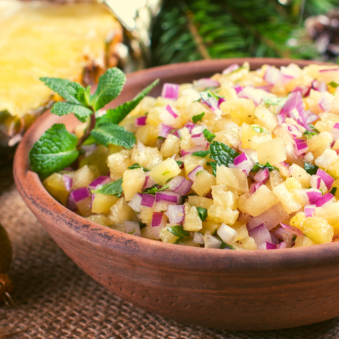 pineapple ginger salsa on a bowl with garnish