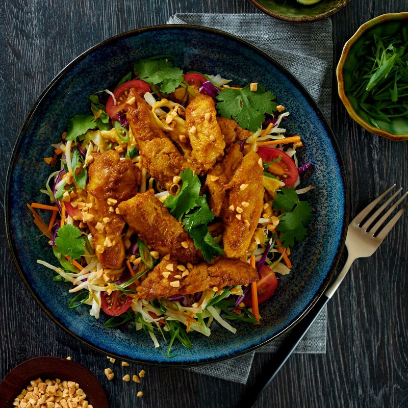 Satay Chicken Salad on Blue Background