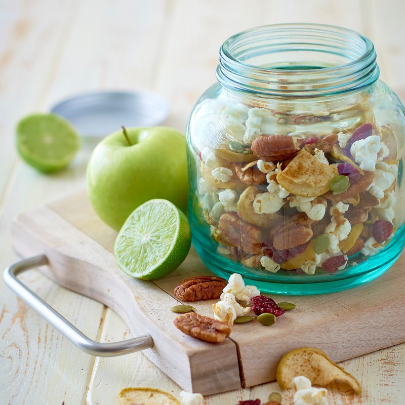 Spicy Apple and Pecan Trail Mix on Wooden Table